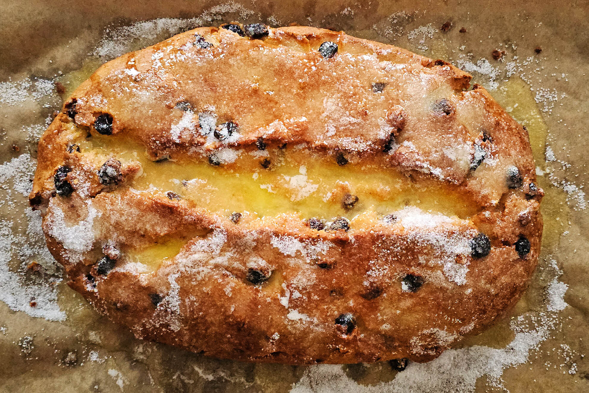 Christstollen Stollen buttern und zuckern