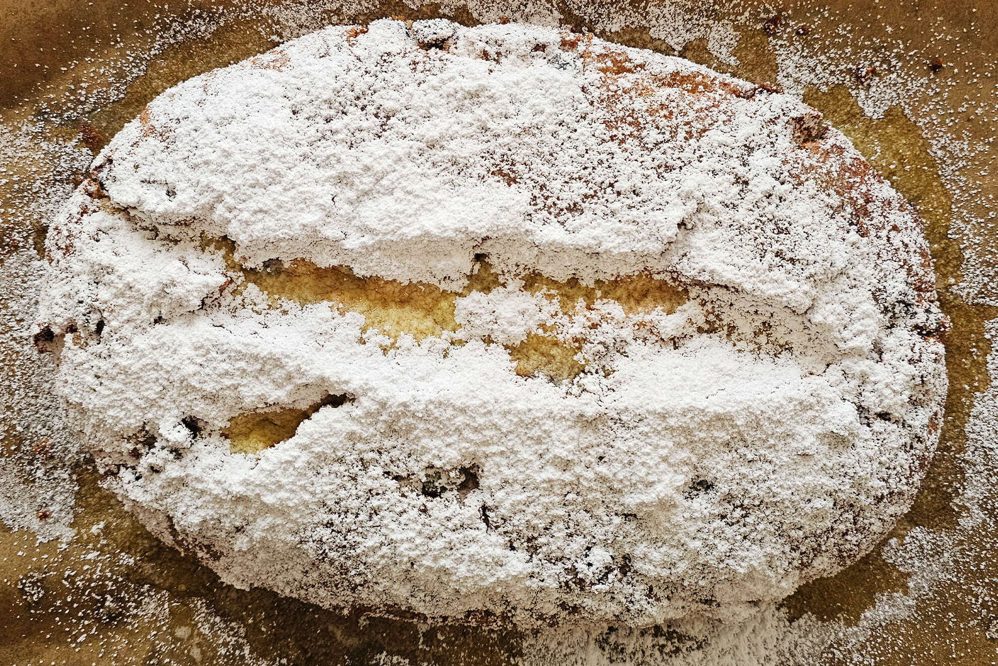 Christstollen Stollen buttern und zuckern